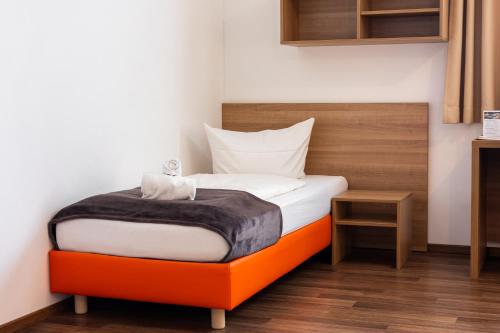 Orange Hotel und Apartments - image 3