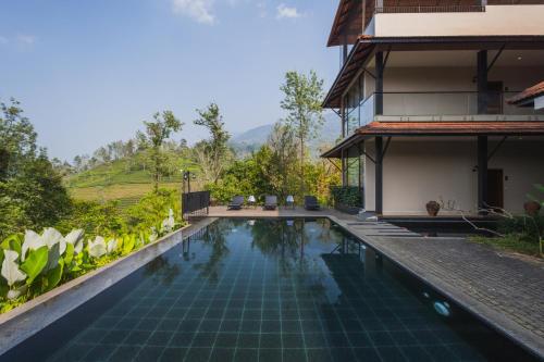 Zwembad, Flora Vythiri Resort in Pookode