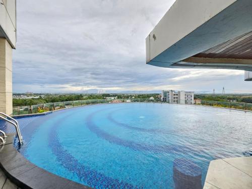 Swimming pool, B Residence BSD By LiviRooms Tangerang in Pagedangan