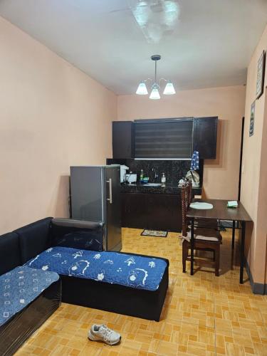 Mel's Place U2 Batangas Free Parking Feee Wifi w Smart TV Netflix Hot & Cold Shower 4 Adults and kids