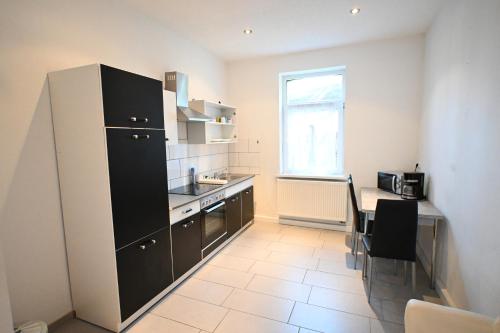 Konyha, MeisterWerk Apartments - Pension für Monteure (MeisterWerk Apartments - Pension fur Monteure) in Bitterfeld-Wolfen