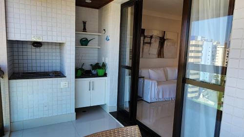 Edifício Atobá, Apartamento de 3 Suítes com Vista ao Mar, Churrasqueira na Varanda e Ar Condicionado, à 150m da Praia com Serviço Incluso, Bertioga (photo 8)