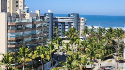 Edifício Atobá, Apartamento de 3 Suítes com Vista ao Mar, Churrasqueira na Varanda e Ar Condicionado, à 150m da Praia com Serviço Incluso, Bertioga (photo 2)