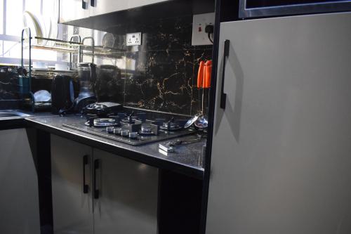 ห้องครัว, Amangee Luxury Apartments in ยิเมทา