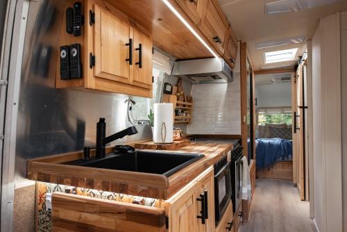 Kitchen, Cozy Lakefront Airstream - Private Deck and Firepit - Sleeps 6 in Smyrna (GA)