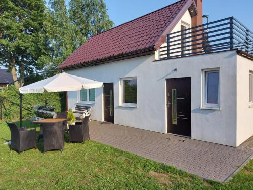 Domki na Mazurach Pluszkiejmy in Galwiecie