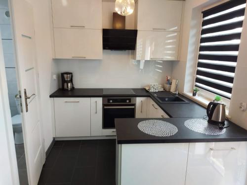 Domki na Mazurach Pluszkiejmy in Galwiecie
