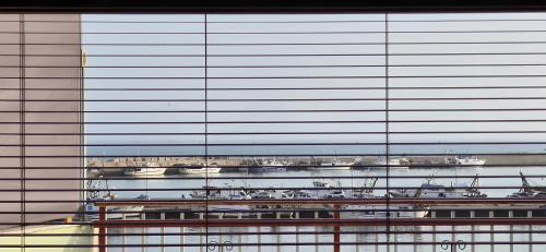 Casa Sunrise - The most secluded terrace at the port in 夏卡