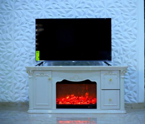 Sala de estar/TV partilhada, Luxurious Lukes Apartment in Benin City