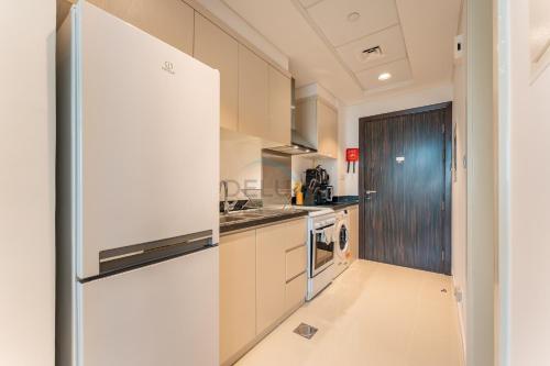 Near Golf Club High-Floor Studio with Balcony Minutes Away From Park, Damac Hills Carson B, Dubailand by Deluxe Holiday Homes, Dubaj (zdjęcie 10)