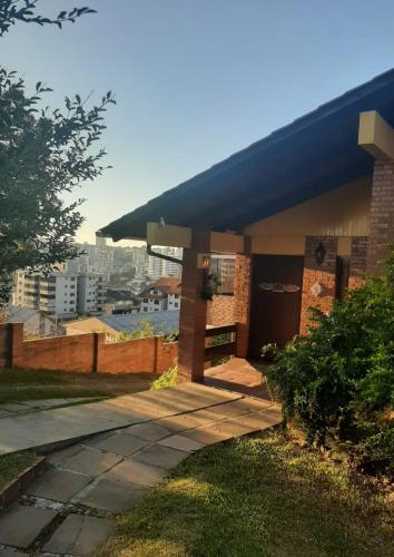 Casa Bela Serra, 5Q, localização 10, churrasqueira, wifi, jardim
