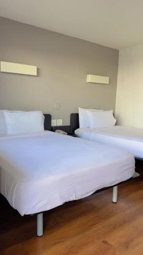 Quadruple Room with Two Queen Beds - Non Smoking