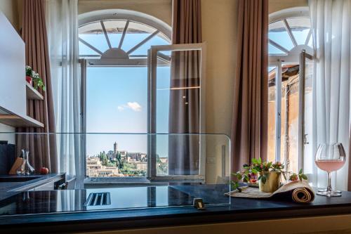 Rose - Appartamento in centro storico con balcone con vista