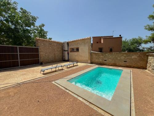 Cal Gabarró - Casa para 12 con piscina, WiFi, AC y BBQ gîte à louer Vilanova de Meià