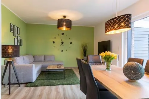 Ferienwohnung Sonnenstrahl am Harkebrügger See mit Sauna in Barßel, Deutschland