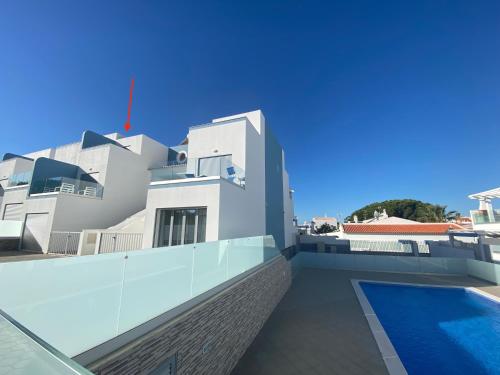 Swimming pool, Luxury Beach Apartment in Vila Nova De Cacela