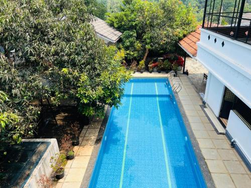 Empire One Bedroom with Common Pool in Muttil