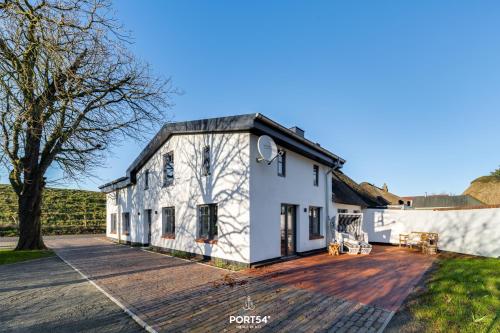 Фасада на хотела, Ferienhaus Deichoase Hedwigenkoog in Hedwigenkoog