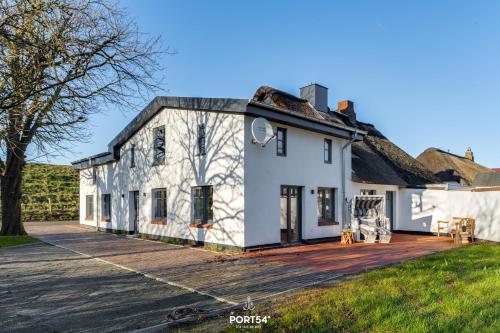 Фасада на хотела, Ferienhaus Deichoase Hedwigenkoog in Hedwigenkoog