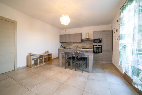virtuve, Residence dei Fiori - Appartamento PEONIA in Pontecchio Polesine