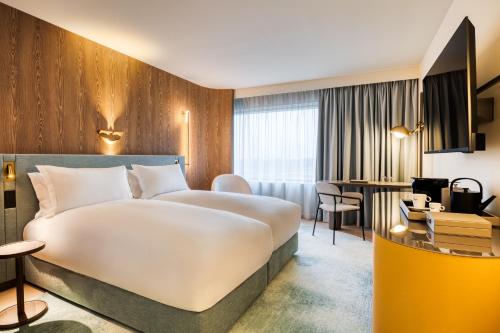 โมเวนพิค บรัสเซลส์ แอร์พอร์ต (Movenpick Brussels Airport) near สนามบินบรัสเซลส์