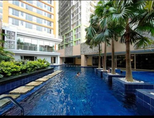 Studio 203 T2 Sunshine100 Wifi 65InchesTV PoolAccess bunkbed