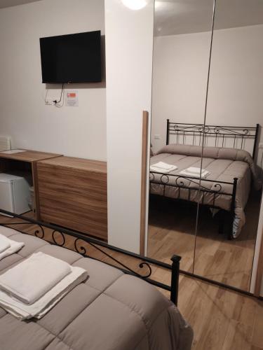 1 queen bed, 1 bunk bed, 1 sofa bed