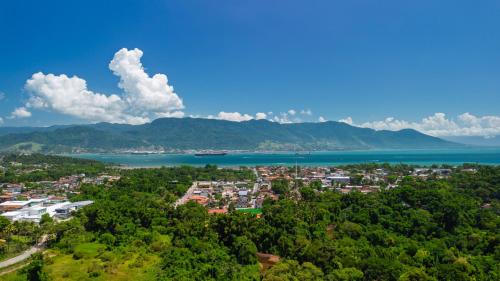 ทัศนียภาพ, Casa com otima localizacao e churrasqueira in อกวาบรันกา