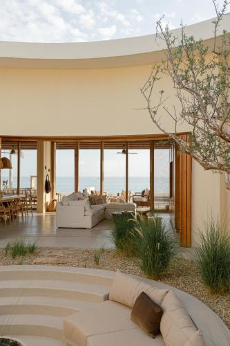 Iekārtas, Casa Suna frente a la playa in La Ribera