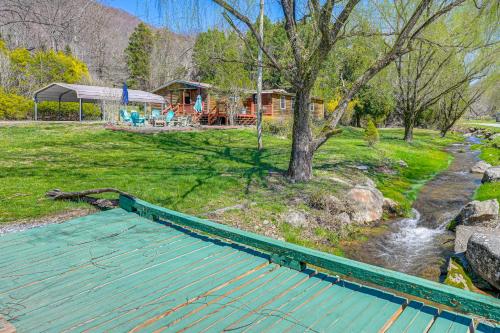 Fire Pit and Decks Creekside Cabin in Robbinsville Fire Pit and Decks Creekside Cabin in Robbinsville