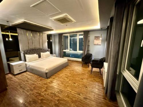 Elevated Luxury Gold Crest Mall Apartments with Al Fatah store by HBA - image 2