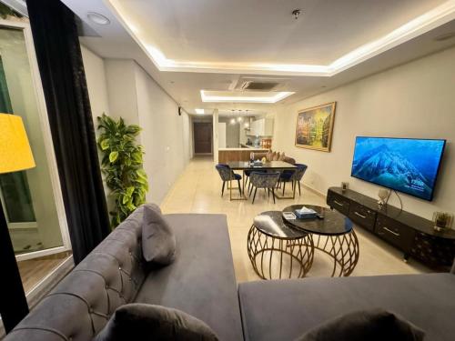 Elevated Luxury Gold Crest Mall Apartments with Al Fatah store by HBA - image 3