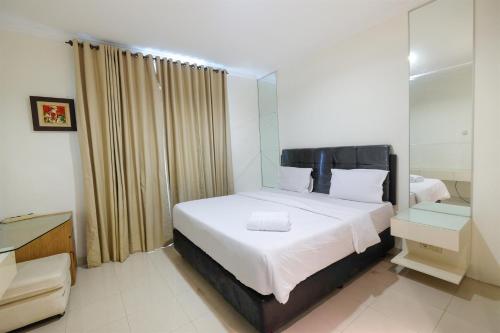 Spacious 2BR Bellezza Apartment By Travelio, Jakarta