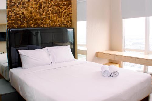 Restful and Modern Studio at Vasanta Innopark Apartment By Travelio