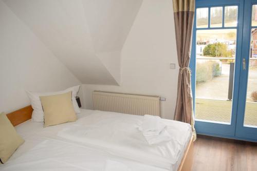 Ferienhaus am Yachthafen in Altensien