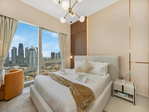 Skyline Serenity Holiday Home I Crown Jewel 2 Bedroom Apartments I Iconic Burj Khalifa and Fountain Views I Free Parking Gym Pool Wi-Fi and PS5 - main image