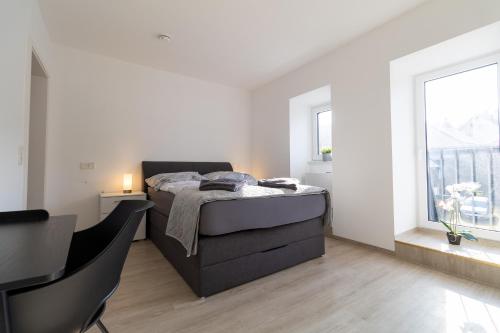 Fewomo, Mosel Maisonette, mit Terrasse & Winzerflairallee, für 6 Perfekt, für 8 geeignet, Brauneberg (fotografie 4)