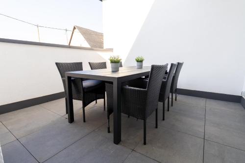 Fewomo, Mosel Maisonette, mit Terrasse & Winzerflairallee, für 6 Perfekt, für 8 geeignet, Brauneberg (fotografie 7)
