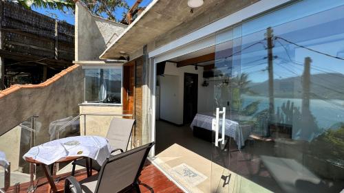 ระเบียง/ชานเรือน, Chale Terapia com vista para o mar, WiFi e ar in หาดปอร์ติงโย