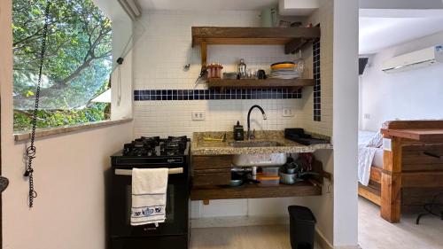 ห้องครัว, Chale Jabuticabeira com Wi-Fi e vista para o mar in หาดปอร์ติงโย