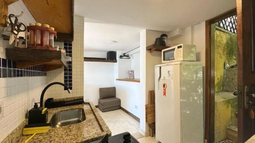 ห้องครัว, Chale Jabuticabeira com Wi-Fi e vista para o mar in หาดปอร์ติงโย