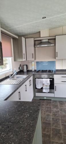 Luxury 6 berth caravan with large decking Luxury 6 berth caravan with large decking