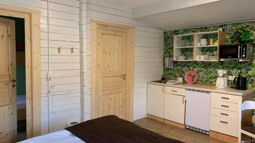 廚房, Strandlust Döbeln - Bungalow für eine gemütliche Auszeit zu jeder Jahreszeit (Strandlust Dobeln - Bungalow fur eine gemutliche Auszeit zu jeder Jahreszeit) in 德伯爾恩