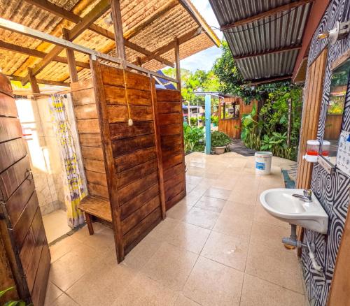 Vannas istaba, Hostel Casa de las Palmas Tours in Letīcija