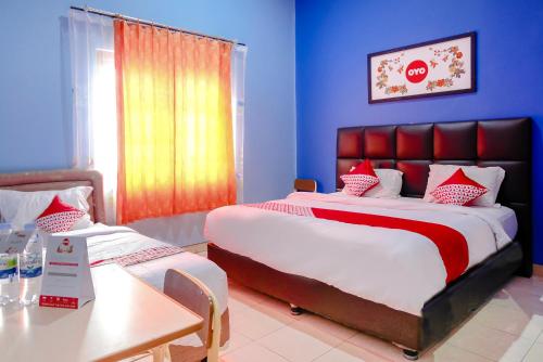 Hotel O Guest House Amalia Malang Room Type - Family Suite