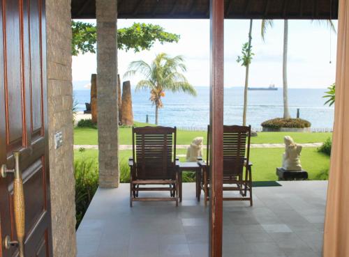 Sea Breeze Candidasa Room Type - Deluxe Sea Front Bungalow Sea Breeze Candidasa Room Type - Deluxe Sea Front Bungalow