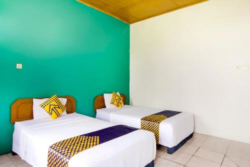 Hotel O Karya Nunggal Asri Room Type - Small Twin Room