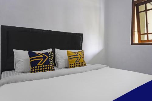 Hotel O Wisma Asri Putra Syariah - Tap to explore photos