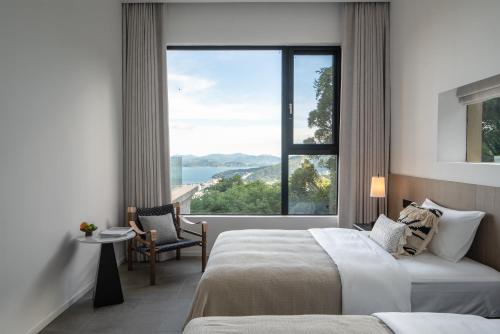 Twin Room with Sea View room in Miyue Shenzhen Tianlu Secret Wild Wizard Holiday Hotel