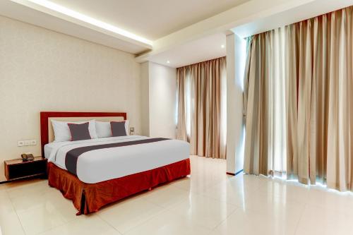 Deluxe Suite room in Collection O Legian Near Pantai Kuta Formerly Premium Legian